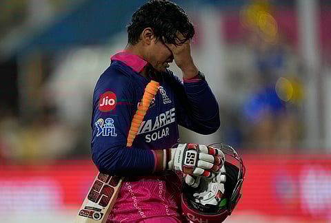 Rajasthan Royals' Vaibhav Sooryavanshi reacts as he walks off the field after losing his wicket during the Indian Premier League cricket match between Mumbai Indians and Rajasthan Royals in Guwahati.