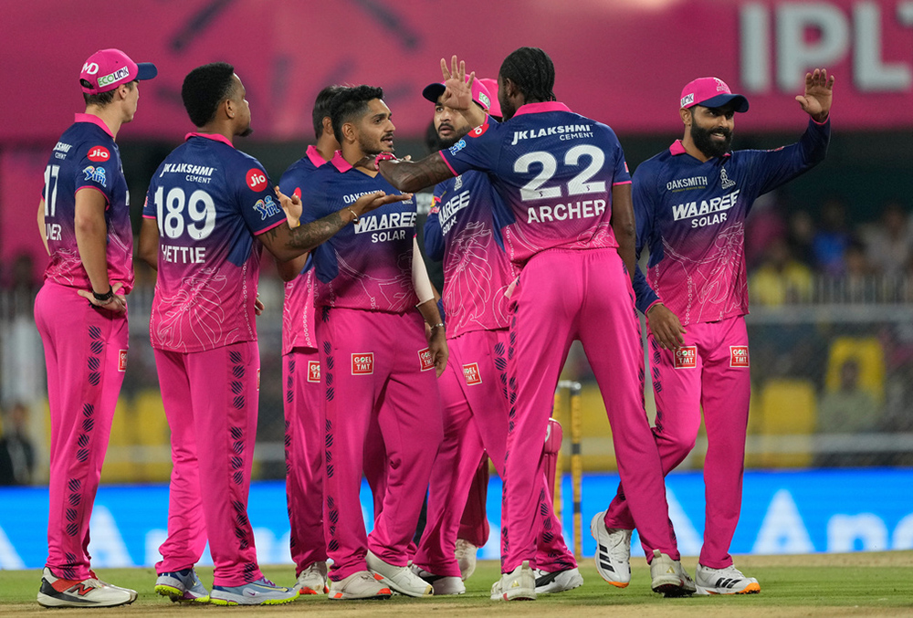 Rajasthan Royals' Tushar Despande celebrates with teammates the wicket of Mumbai Indians' Shefane Rutherford during the Indian Premier League cricket match between Mumbai Indians and Rajasthan Royals in Guwahati.