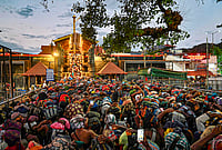 Day In Pics: April 07, 2026 | Photo: PTI : Nine-judge constitution bench to hear review pleas on Tuesday, April 7, 2026, in a case related to the entry of women in the Sabarimala Temple. People are seen waiting to offer prayers at the temple, in Pathanamthitta district, Kerala, in this file photo dated Tuesday, Jan. 13, 2026.