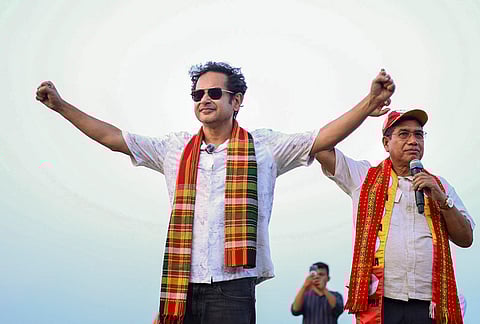 Tipra Motha chief Pradyot Kishore Manikya Debbarma, left, during a public meeting ahead of the Assembly elections, in Agartala.
