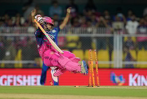 Rajasthan Royals' Vaibhav Sooryavanshi lost his balance while running between the wickets and accidentally hit the stumps during the Indian Premier League cricket match between Mumbai Indians and Rajasthan Royals in Guwahati.