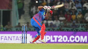 | Photo: AP/Manish Swarup : Delhi Capitals' Nitish Rana attempts to play a rising delivery during the Indian Premier League cricket match between Lucknow Super Giants and Delhi Capitals in Lucknow, India.