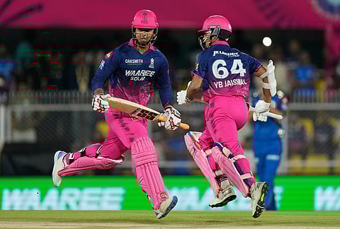 Rajasthan Royals' Yashasvi Jaiswal, right, and Vaibhav Sooryavanshi run between the wickets to score during the Indian Premier League cricket match between Mumbai Indians and Rajasthan Royals in Guwahati.