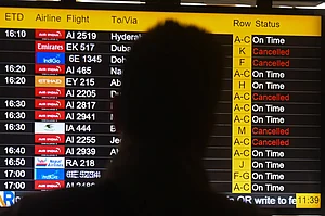 Imago : Flights Disrupted Following Strikes On Iran, In New Delhi Passengers look at the screen displaying flight details as several flights are cancelled due to regional airspace closures following escalating tensions and reported military strikes involving Iran, Israel, and the United States in New Delhi, India, on March 1, 2026.