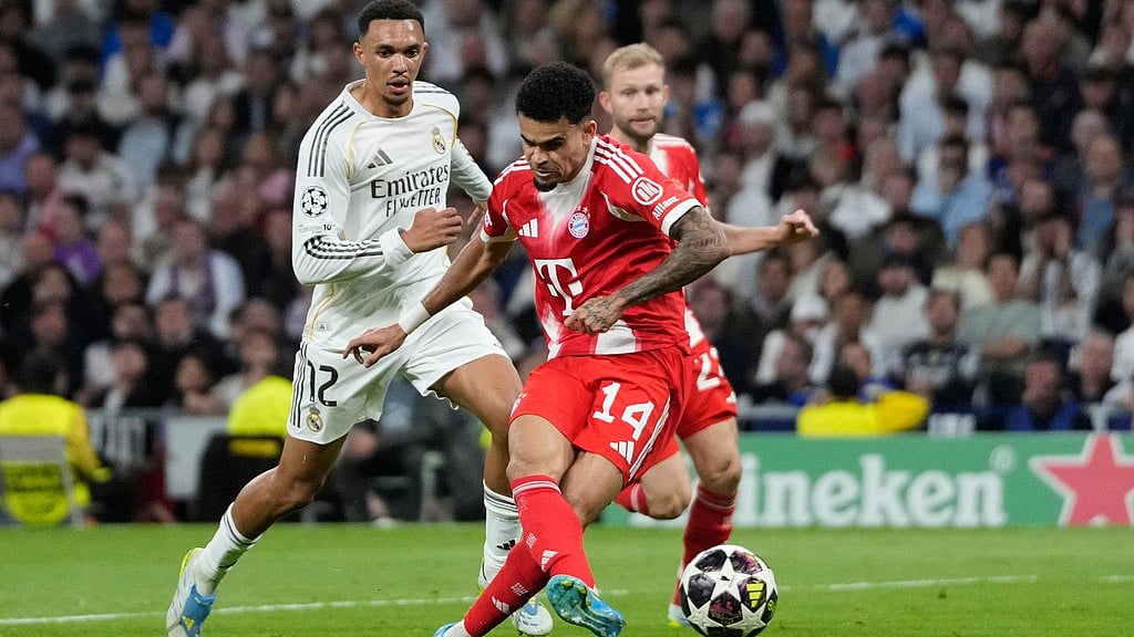 Bayern's Luis Diaz scores his side's opening goal during the Champions League quarterfinal first leg soccer match between Real Madrid and Bayern Munich in Madrid, Spain, Tuesday, April 7, 2026. - AP Photo/Bernat Armangue