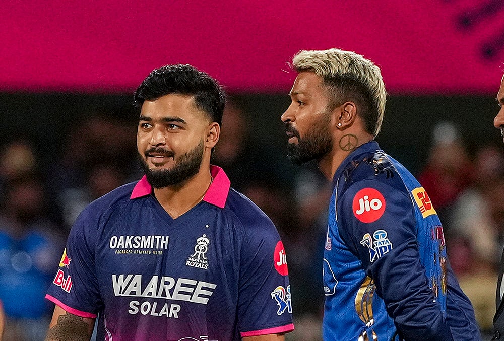 Mumbai Indians' captain Hardik Pandya and Rajasthan Royals' captain Riyan Parag during toss ahead of an Indian Premier League (IPL) 2026 T20 cricket match between Rajasthan Royals and Mumbai Indians, in Guwahati. - | Photo: PTI/Swapan Mahapatra