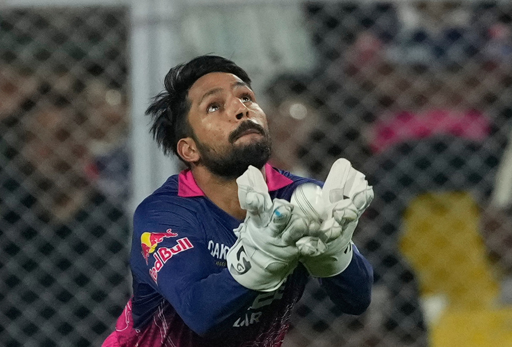 Rajasthan Royals' Dhruv Jurel takes the catch to dismiss Mumbai Indians' Ryan Rickelton during the Indian Premier League cricket match between Mumbai Indians and Rajasthan Royals in Guwahati.
