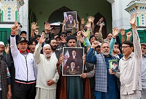 | Photo: Yasir Iqbal : People raise slogans as they gather to celebrate in response to the ceasefire agreement between Iran, the United States and Israel, after US President Donald Trump pulled back from his threats to destroy Iranian civilization, in Srinagar, Jammu and Kashmir.