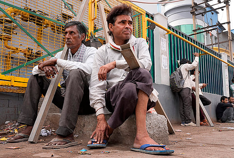 The workers go days without getting hired, questioning why the West Asia crisis is hurting their income.