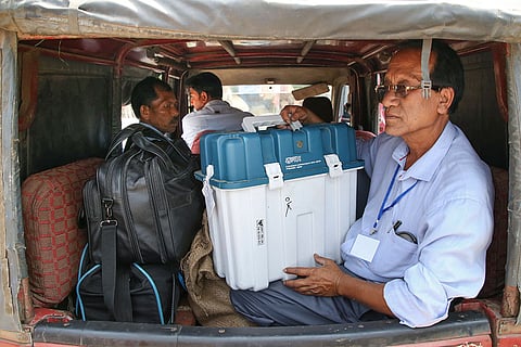 North Tripura: Polling officials carrying election materials depart from a distribution centre, to polling booths on the eve of Bye-election for the 56-AC Dharmanagar assembly seat, in North Tripura district.