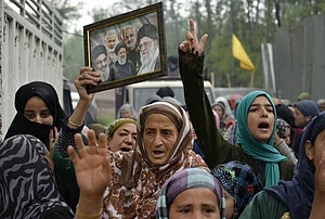 Yasir Iqbal : People raise slogans and hold a portrait of late Iran's Supreme Leader Ayatollah Ali Khamenei, in response to the ceasefire agreement between Iran, the United States and Israel, after US President Donald Trump pulled back from his threats to destroy Iranian civilization, in Srinagar, Jammu and Kashmir, Wednesday, April 8, 2026