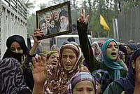 Yasir Iqbal : People raise slogans and hold a portrait of late Iran's Supreme Leader Ayatollah Ali Khamenei, in response to the ceasefire agreement between Iran, the United States and Israel, after US President Donald Trump pulled back from his threats to destroy Iranian civilization, in Srinagar, Jammu and Kashmir, Wednesday, April 8, 2026