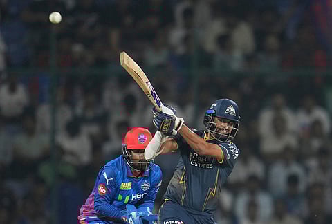 Gujarat Titans' Washington Sundar hits a boundary during the Indian Premier League cricket match between Delhi Capitals and Gujarat Titans in New Delhi.