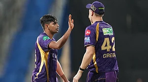 AP : Kolkata Knight Riders' Kartik Tyagi, left, and Cameron Green celebrate the wicket of Mumbai Indians' Suryakumar Yadav during their Indian Premier League match in Mumbai.