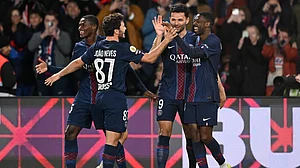 | Photo: AP/Emma Da Silva : PSG players celebaret after a goal during a League One soccer match between Paris Saint-Germain and Toulouse in Paris, France, Friday, April 3, 2026.