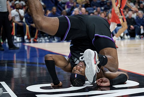 Utah Jazz forward Blake Hinson (2) flips after shooting against New Orleans Pelicans guard Trey Alexander during the first half of an NBA basketball game in New Orleans.