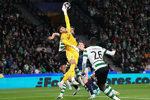 Sporting's goalkeeper Rui Silva makes a save during the Champions League quarterfinals, first leg, soccer match between Sporting CP and Arsenal, in Lisbon.