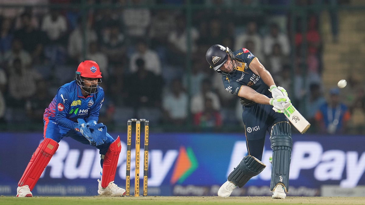 Jos Buttler in action against Delhi Capitals during DC vs GT IPL 2026 match at New Delhi.  - AP Photo
