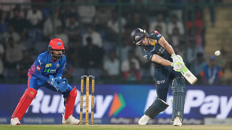 Jos Buttler in action against Delhi Capitals during DC vs GT IPL 2026 match at New Delhi. - AP Photo