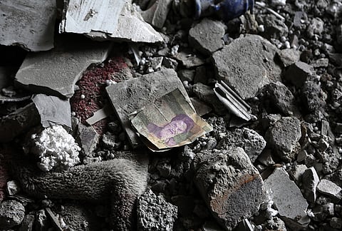 An interior view of a damaged house as search and rescue teams are conducting operations in homes damaged by US and Israeli missile strikes carried out at midnight in Ray, south of Tehran, Iran on March 27, 2026. The attacks caused extensive damage to numerous buildings, and at least five people lost their lives. 