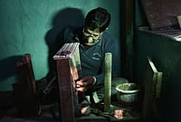 The War in West Asia Hurts Kashmir's Handicrafts Trade Yasir Iqbal : Mohammad Hanif Kashmiri handicraft worker in his workstation
