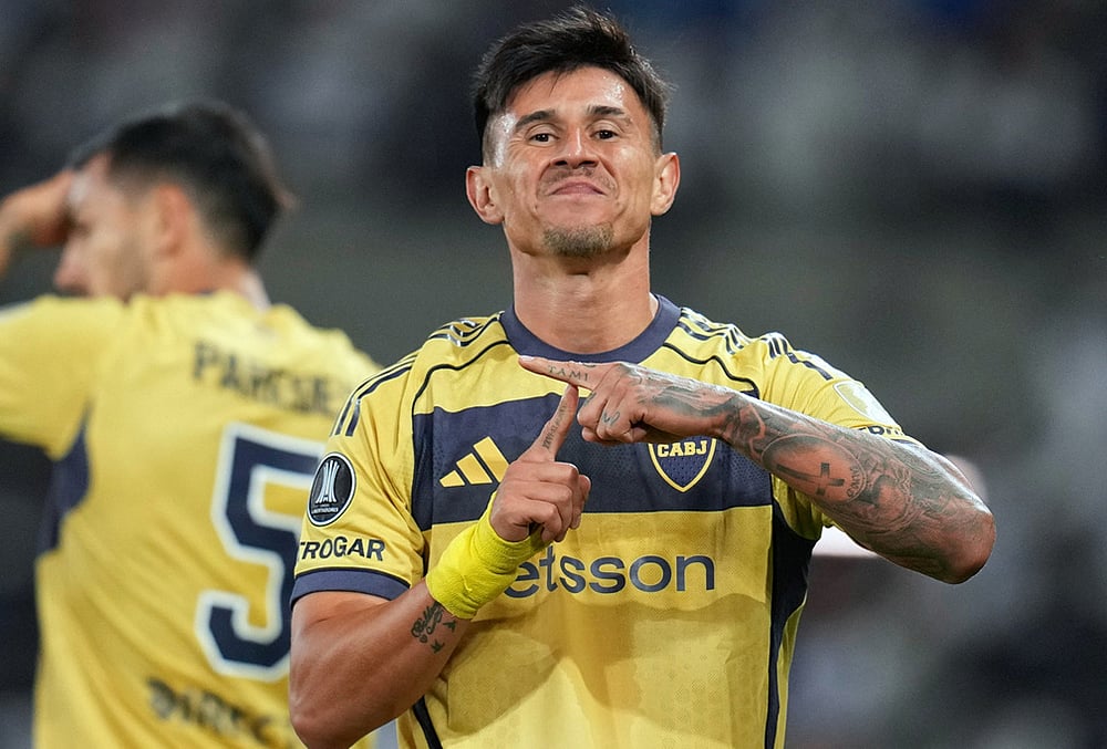 Adam Bareiro of Argentina's Boca Juniors celebrates after scoring his side's second goal against Chile's Universidad Catolica during a Copa Libertadores Group D soccer match in Santiago, Chile. - | Photo: AP/Esteban Felix