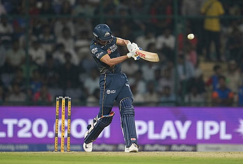 Gujarat Titans' captain Shubman Gill hits a boundary during the Indian Premier League cricket match between Delhi Capitals and Gujarat Titans in New Delhi.