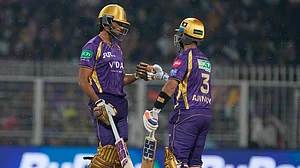 AP : Kolkata Knight Riders' captain Ajinkya Rahane, right, and Angkrish Raghuvanshi bat during the Indian Premier League match against Punjab Kings in Kolkata.