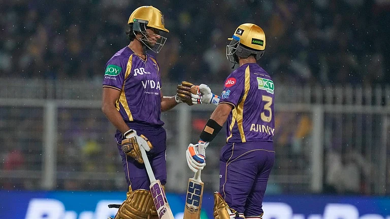Kolkata Knight Riders' captain Ajinkya Rahane, right, and Angkrish Raghuvanshi bat during the Indian Premier League match against Punjab Kings in Kolkata. - AP