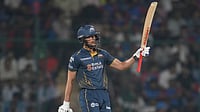 AP/Manish Swarup : Gujarat Titans' captain Shubman Gill celebrates his fifty runs during the Indian Premier League match between Delhi Capitals and Gujarat Titans in New Delhi.