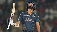 AP/Manish Swarup : Gujarat Titans' Washington Sundar celebrates his fifty runs during the Indian Premier League match between Delhi Capitals and Gujarat Titans in New Delhi.