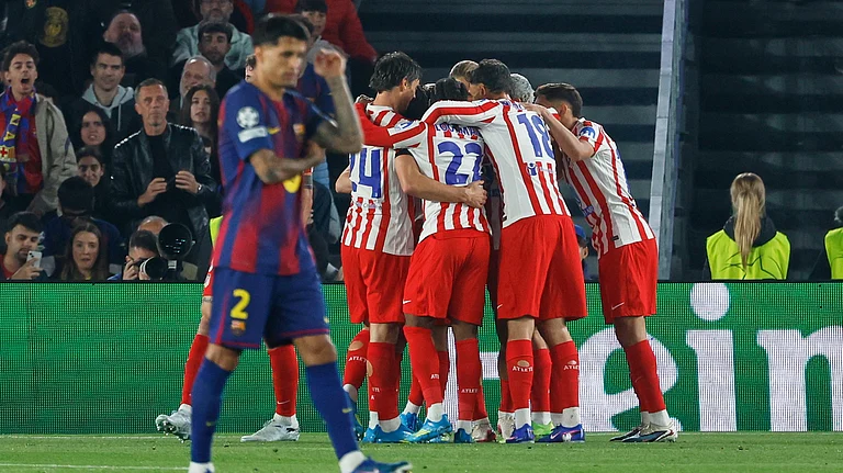 Atletico Madrid players celebrate after Atletico Madrid's Julian Alvarez. - Joan Monfor/AP