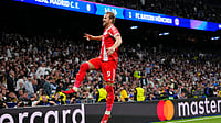 AP Photo : Harry Kane celebrates after scoring the winner against Real Madrid in UEFA Champions League 2025-26 first leg quarter-final at the Santiago Bernabeu in Madrid. 