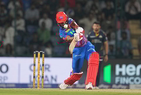 Delhi Capitals' KL Rahul hits a six during the Indian Premier League cricket match between Delhi Capitals and Gujarat Titans in New Delhi.