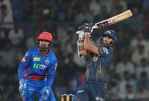 Gujarat Titans' Washington Sundar hits a six during the Indian Premier League cricket match between Delhi Capitals and Gujarat Titans in New Delhi.