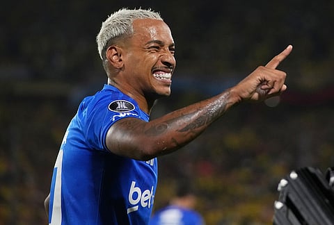 Matheus Pereira of Brazil's Cruzeiro, celebrates scoring his side's opening goal against Ecuador's Barcelona during a Copa Libertadores soccer Group D match in Guayaquil, Ecuador.