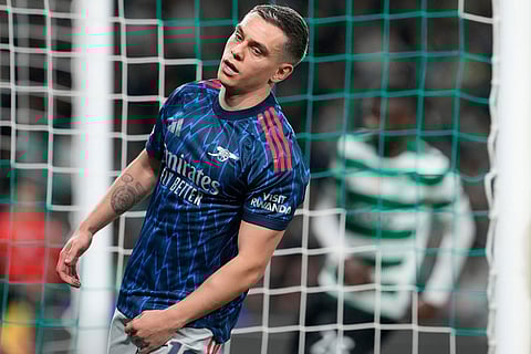 Arsenal's Leandro Trossard reacts after missing a chance to score during the Champions League quarterfinals, first leg, soccer match between Sporting CP and Arsenal, in Lisbon.