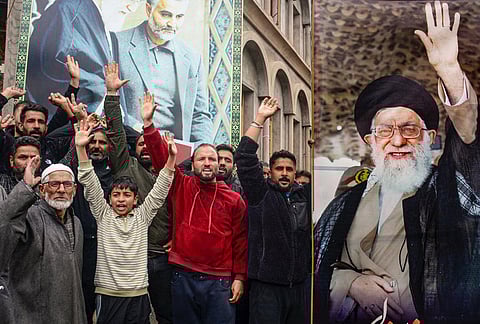 People raise slogans as they gather to celebrate in response to the ceasefire agreement between Iran, the United States and Israel, after US President Donald Trump pulled back from his threats to destroy Iranian civilization, in Srinagar, Jammu and Kashmir.