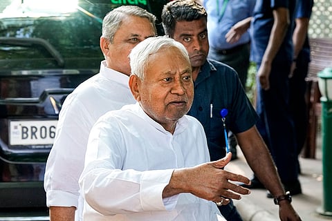 Bihar Chief Minister Nitish Kumar arrives at his residence, in New Delhi, Thursday, April 9, 2026. Kumar has to be sworn in as a Rajya Sabha MP.