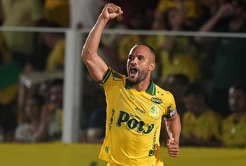 Joao Victor of Brazil's Mirassol celebrates scoring his side's opening goal against Argentina's Lanus during a Copa Libertadores Group G soccer match in Mirassol, Sao Paulo state.