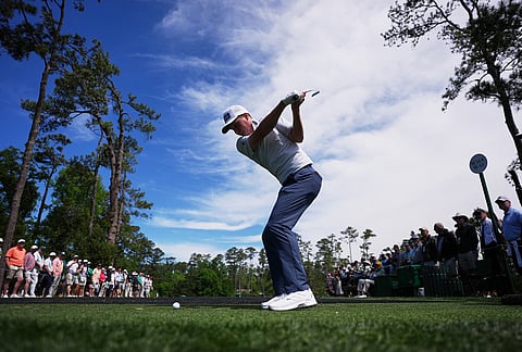Matt McCarty hits his tee shot on the sixth hole during a practice round ahead of the Masters golf tournament at the Augusta National Golf Club in Augusta, Georgia.