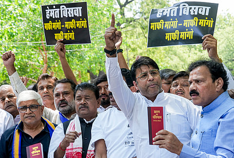 Congress supporters stage a protest against the use of "derogatory language" against party chief Mallikarjun Kharge by Assam Chief Minister Himanta Biswa Sarma, in New Delhi.