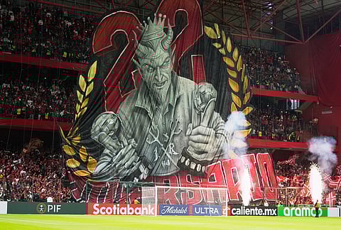 Mexico's Toluca fans display a banner prior to a CONCACAF Champions Cup quarterfinal first leg soccer match against the United States' LA Galaxy in Toluca, Mexico.