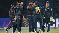 | Photo: AP/Manish Swarup : Gujarat Titans' Mohammed Siraj, centre, celebrates with teammates the wicket of Delhi Capitals' KL Rahul during the Indian Premier League cricket match between Delhi Capitals and Gujarat Titans in New Delhi.