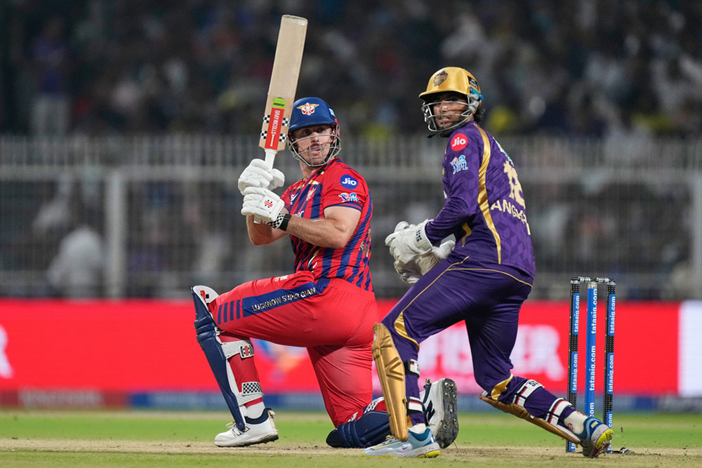 Lucknow Super Giants' Mitchell Marsh plays a shot during the Indian Premier League cricket match between Kolkata Knight Riders and Lucknow Super Giants in Kolkata, India.