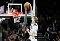 Phoenix Suns Vs Dallas Mavericks, NBA 2026: Suns Shine Late To Outshine Mavericks | Photo: AP/Ross D. Franklin : Dallas Mavericks forward Cooper Flagg (32) has his shot blocked by Phoenix Suns center Khaman Maluach, left, during the second half of an NBA basketball game in Phoenix.