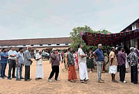Kerala Assembly Elections 2026: Officials Deny Any Violation Of Rules At Strong Room Premises | Photo: AP/ R S Iyer : People queue up to vote outside a polling booth during the Kerala state election in Kochi.