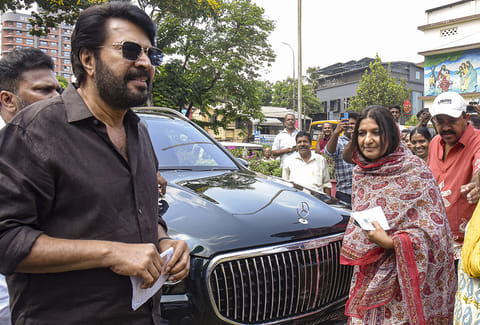 Actor Mammootty arrives to cast vote during the Kerala Assembly elections, in Ernakulam district.