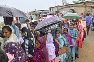 PTI : People wait in queues to cast their votes during the Assam Assembly elections, at a polling station, in Darrang district, Assam, Thursday, April 9, 2026.