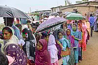 PTI : People wait in queues to cast their votes during the Assam Assembly elections, at a polling station, in Darrang district, Assam, Thursday, April 9, 2026.